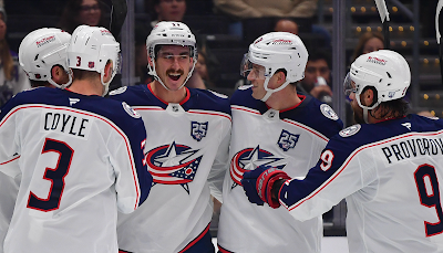 Columbus Blue Jackets forward Mason Marchment celebrates goal with teammates